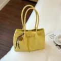 Yellow woven tote bag for women, large capacity stylish shoulder bag for daily commute. - Yellow with Pendant