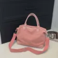 Roze grote reistas, veelzijdige schoudertas en handtas voor korte trips en reizen. - Dieproze