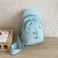 Casual light blue sling bag for women, stylish chest crossbody bag with cute embroidery. - Blue