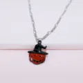 Close-up detail of the Halloween pumpkin witch hat necklace pendant on a fine silver chain. - Necklace (EN023)