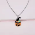 Close-up detail of Halloween pumpkin pendant necklace with cute star witch hat design. - Single Necklace