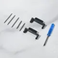 Detailed shot of watch connector adapter and installation tool kit for custom watches. - Black
