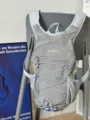 Detailed view of the lightweight outdoor cycling backpack in grey with secure storage and drawstrings. - Gray