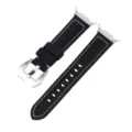Close-up detail view of black leather watch strap with white contrast stitching and metal buckle. - Black Strap Silver Buckle
