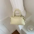 Schicke hellgelbe Umhängetasche im strukturierten Design, stylische Boston Handtasche. - Ohne Anhänger / Gelb