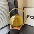 Chic metallic gold spherical handbag with round handle, elegant evening bag for women. - Gold
