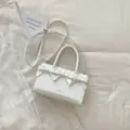 Bolso de mano de cuero PU blanco con lazo para mujer, elegante bolso cruzado para el uso diario. - Blanco