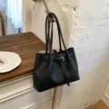 Black woven leather tote bag, stylish shoulder bucket bag for women summer commuting. - Black