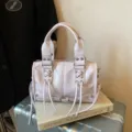 Rosa PU Leder Motorrad Handtasche mit modischen Schnürquasten Details und stabilen Griffen. - Reguläre Passform / Lila