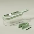 Trancheuse et râpe à légumes multifonctionnelle verte avec conteneur de stockage transparent. - Ensemble / Vert Printemps