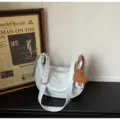 Light blue soft leather crescent shoulder bag, casual dumpling crossbody bag for women daily commute. - Blue + Pendant