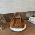 Brown woven leather handbag for women, stylish bucket tote bag with buckle strap, daily use. - No Pendant / Brown
