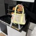 Yellow canvas leather patchwork handbag with chic white lace bow and cute heart pendant. - Yellow Bag