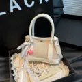 Chic contrast canvas leather mini handbag with cute heart charm and elegant lace ribbon. - White Bag Style