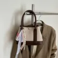 Women's contrast color canvas handbag, stylish brown leather trim casual tote with chic lace charm. - Coffee Single Bag
