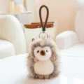 Cute hedgehog plush keychain, soft toy bag charm with braided strap, fluffy animal pendant. - Hedgehog / 12cm / Brown