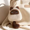 Cute fluffy cat plush keychain with tail pendant, soft stuffed animal bag charm accessory. - Siamese Cat Pendant