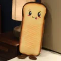 Cute toast plush pillow, soft bread long cushion for girls bedroom sleeping and cozy room decor. - Cute Expression - Black Bread / 40CM