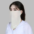 Close-up detail of ice silk sun protection face mask, lightweight breathable neck and face cover. - Bean Green