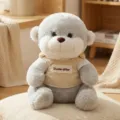 Cute gray otter plush toy wearing a soft beige corduroy vest, perfect kids birthday gift doll. - Otter / 22cm