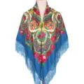 Detailed shot of ethnic floral fringe shawl, traditional Russian style blue square scarf. - Teal
