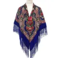 Close-up detail of traditional Russian floral shawl with rich blue background and delicate fringe. - Sapphire Blue