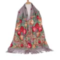 Retro floral print long scarf detail showing vibrant red roses and elegant fringe design. - Khaki