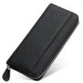 Cartera larga de cuero negro con cierre de cremallera y acabado texturizado elegante. - Negro