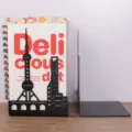 Creative black metal bookends with city skyline silhouette, L-shaped desktop book shelf support. - Shanghai Landmarks