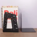 Creative black metal architectural silhouette bookends, modern L-shaped book holder. - CCTV Building