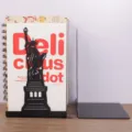 Creative black metal bookend featuring Statue of Liberty silhouette for desktop book organization. - Statue of Liberty