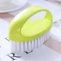 Brosse de nettoyage de chaussures ovale colorée avec des poils blancs pour la maison. - Vert