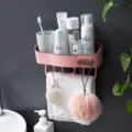 Wall-mounted bathroom storage shelf, punch-free plastic organizer with hooks for towels. - Pink