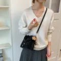 Black suede bucket bag, stylish crossbody handbag with cute floral pendant for women. - With Pendant / Black