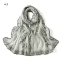 Detailed view of light green scarf with pine branch sequin embroidery and lace edge. - Polka Dot (#3)