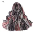 Detailed view of the gradient rayon long scarf showcasing soft wrinkled texture and fine fringe. - Pattern #2