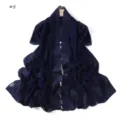 Detailed shot of dark blue chiffon scarf featuring elegant embroidered floral lace trim, lightweight design. - Dark Navy