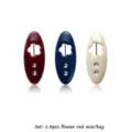 Detailed view of colorful plastic hijab pins with flower cutout and sparkling rhinestones. - Flower / Pack of 3 / Red