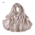 Sequin embroidered lace scarf detail, lightweight breathable fabric, elegant pink shawl close up. - Style #9