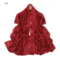 Detailed view of the red chiffon scarf featuring exquisite floral lace embroidery and lightweight fabric. - Red