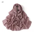Detail shot of the lightweight mauve scarf featuring vertical stripes and sparkling sequins. - #7