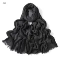 Detailed view of dark grey crinkled slub cotton long scarf featuring stylish frayed edges. - Dark Gray