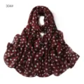 Chiffon scarf detail view, breathable lightweight fabric with classic white polka dot pattern. - 304#