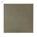 Detail view of the shiny solid color square chiffon scarf, showing smooth texture and luster. - Color 4
