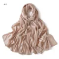 Detail view of the soft satin silk scarf showing smooth texture and elegant drape effect. - Style #9