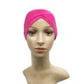 Close-up detail of the hot pink cross turban cap showing the soft modal fabric and pleated design. - Rose Red