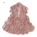 Detailed shot of pink mesh shawl with rhinestone cross motifs on wooden hanger. - 4#