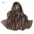 Detail shot of the shiny satin long scarf showing soft draped texture and elegant dark brown color. - Style #9