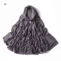 Solid color mercerized cotton jersey hijab scarf detail view showing rhinestone floral pattern. - Gray