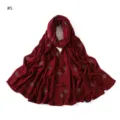 Detailed red mercerized cotton long scarf featuring rhinestone four leaf clover motifs and lines. - Red